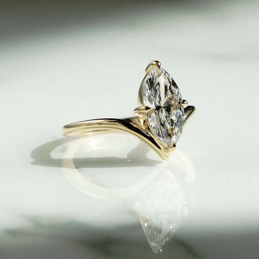 /public/photos/live/Solitaire Marquise Moissanite V Curve Wishbone Ring 616 (3).webp